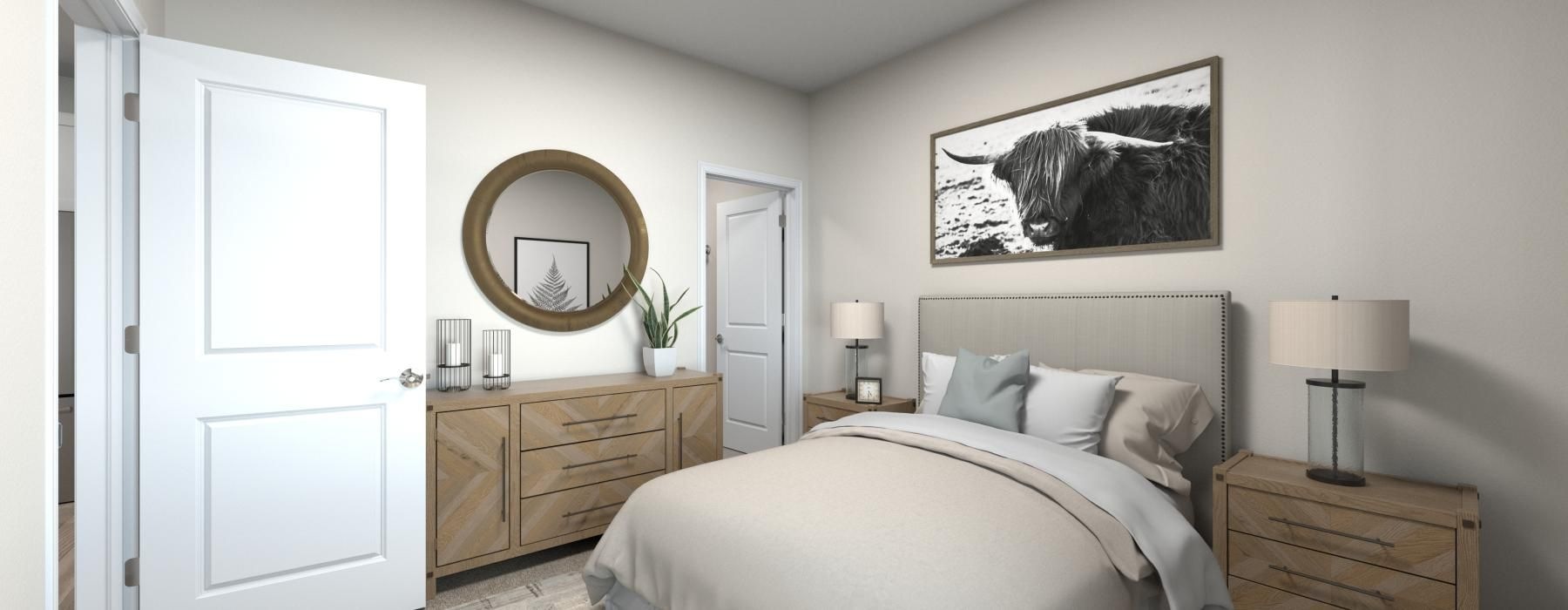 a bedroom with a bed and a fan