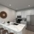 a kitchen with white cabinets